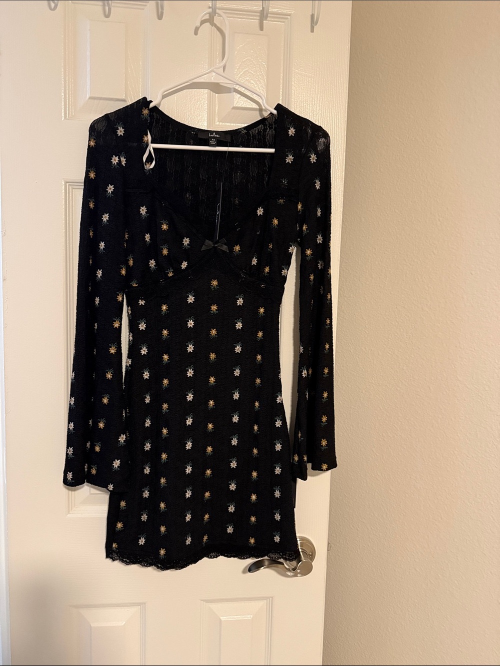 Lulu's Black Long-Sleeve Mini Dress with White & Gold Star Motif
